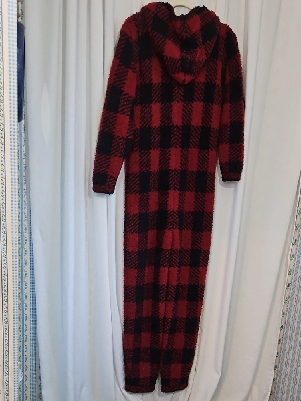 SKIMS Cozy Knit Unisex Onesie in the red and black "Brick Buffalo Check" pattern - Picture 4 of 6